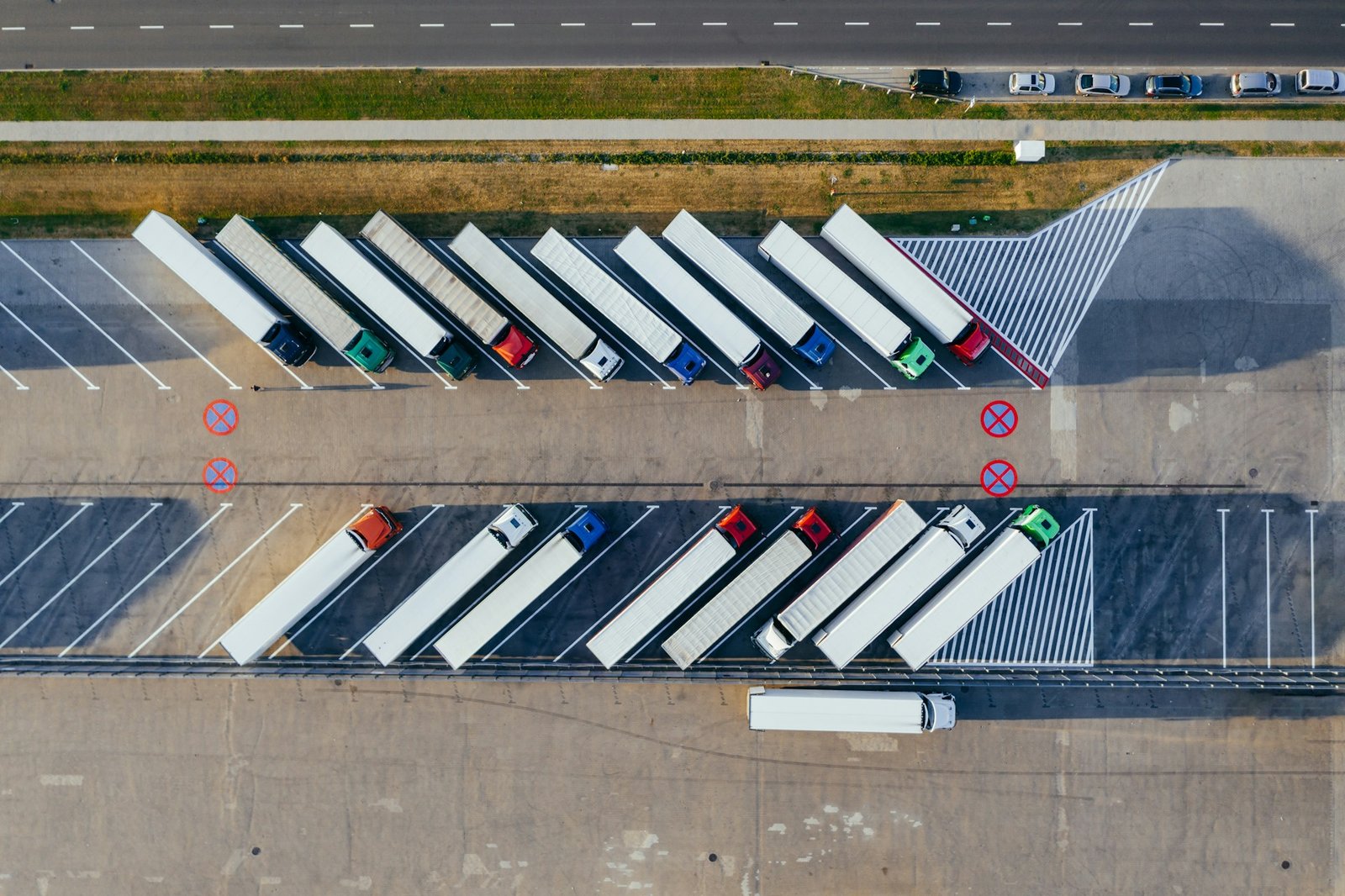 Aerial view of trucks staged in a logistics yard