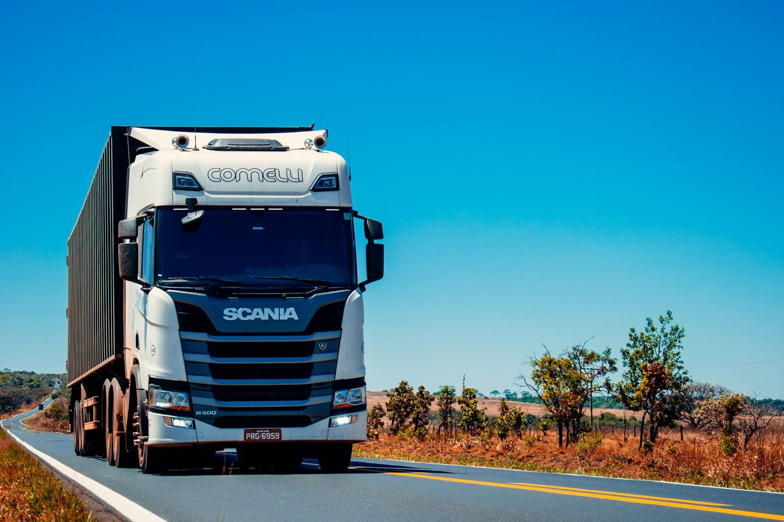 Freight trucks lined up at a logistics yard